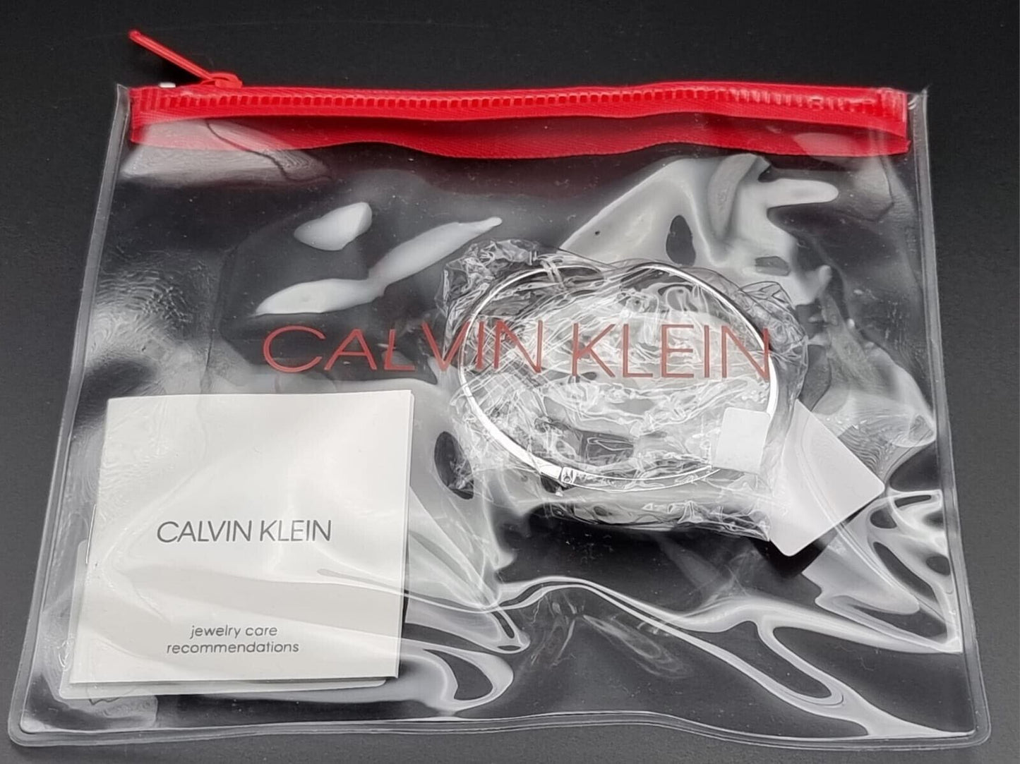 New CALVIN KLEIN INFORMAL KJ6GMD0001XS STAINLESS STEEL SILVER BANGLE - SIZE XS