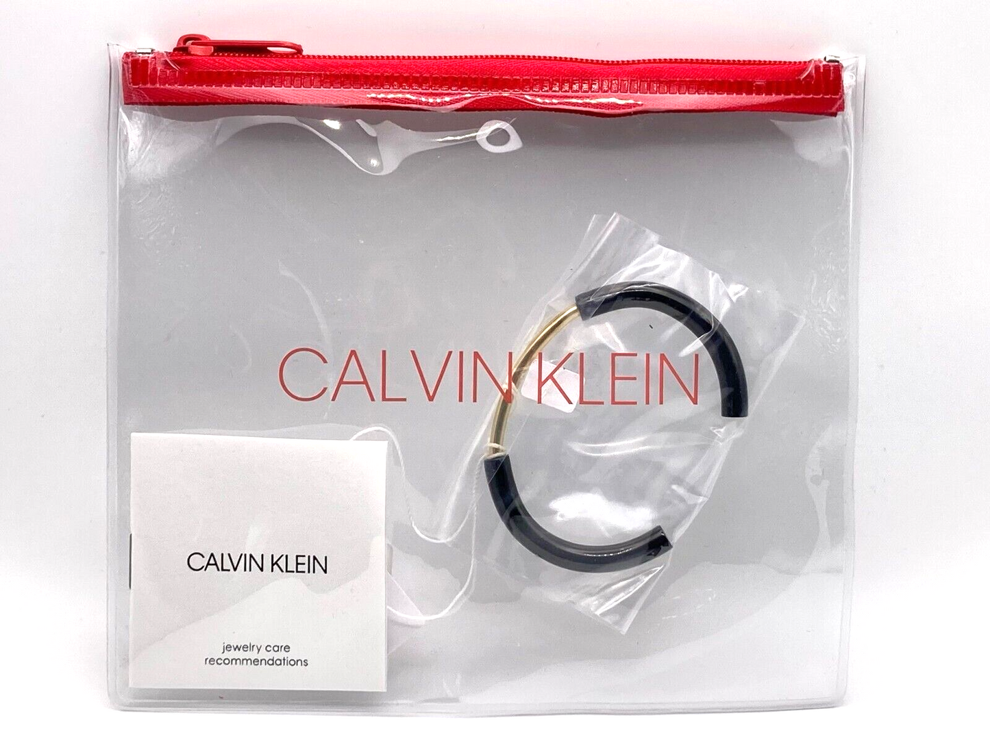 New CALVIN KLEIN DISCLOSE BANGLE KJ5FBF2001XS - BLACK/GOLD - SIZE XS