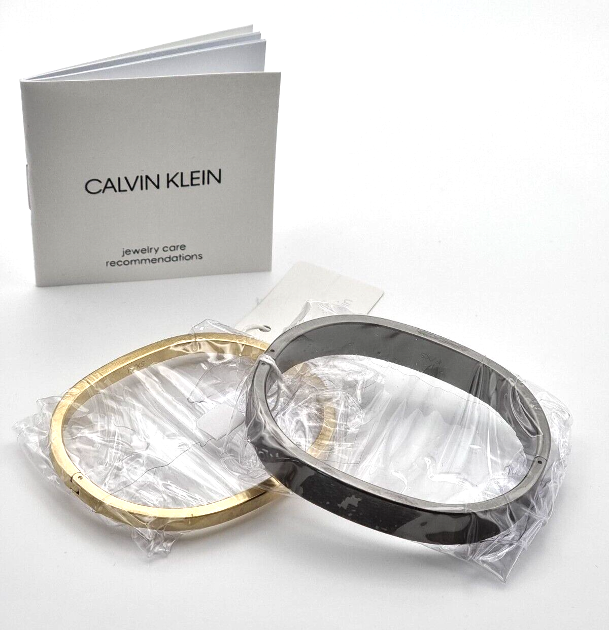 New CALVIN KLEIN ARMREIF SET HOOK GUNMETAL/GELBGOLD - XS