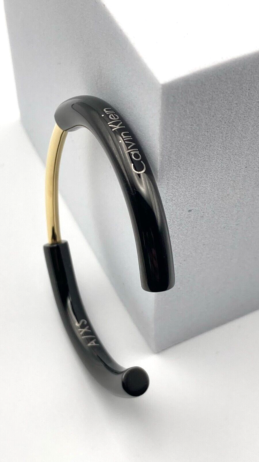 New CALVIN KLEIN DISCLOSE BANGLE KJ5FBF2001XS - BLACK/GOLD - SIZE XS