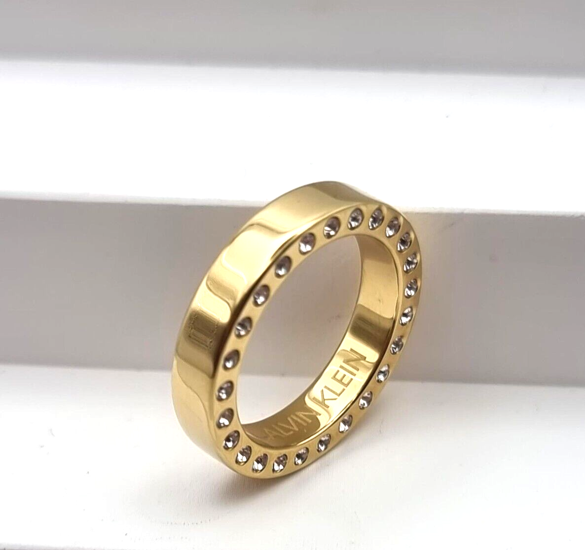 Neu CALVIN KLEIN RING HAKEN GOLD – GR. 50