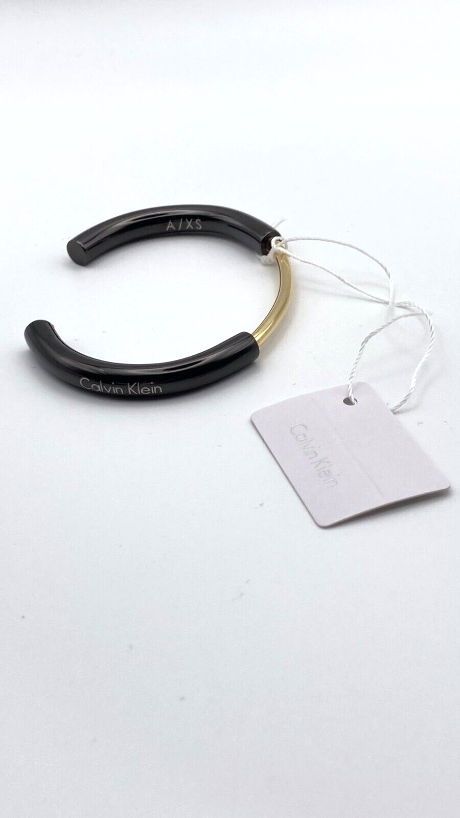 New CALVIN KLEIN DISCLOSE BANGLE KJ5FBF2001XS - BLACK/GOLD - SIZE XS