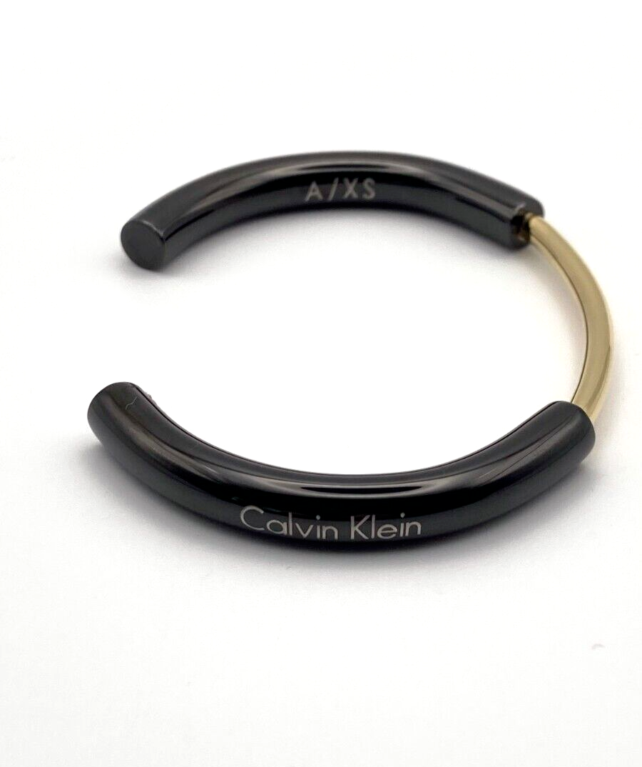 New CALVIN KLEIN DISCLOSE BANGLE KJ5FBF2001XS - BLACK/GOLD - SIZE XS