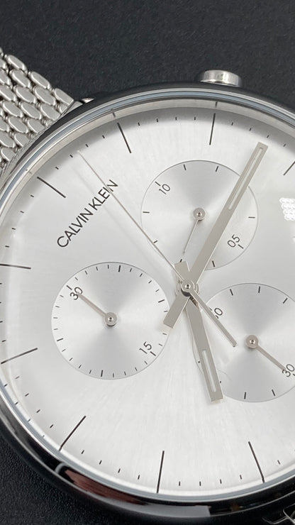 Neue, in der Schweiz hergestellte CALVIN KLEIN High Noon Chronograph Quarz Herrenuhr mit silbernem Zifferblatt