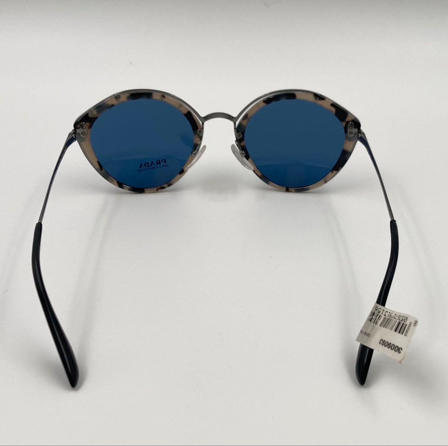 Round sunglasses with black frames and blue lenses on a white background